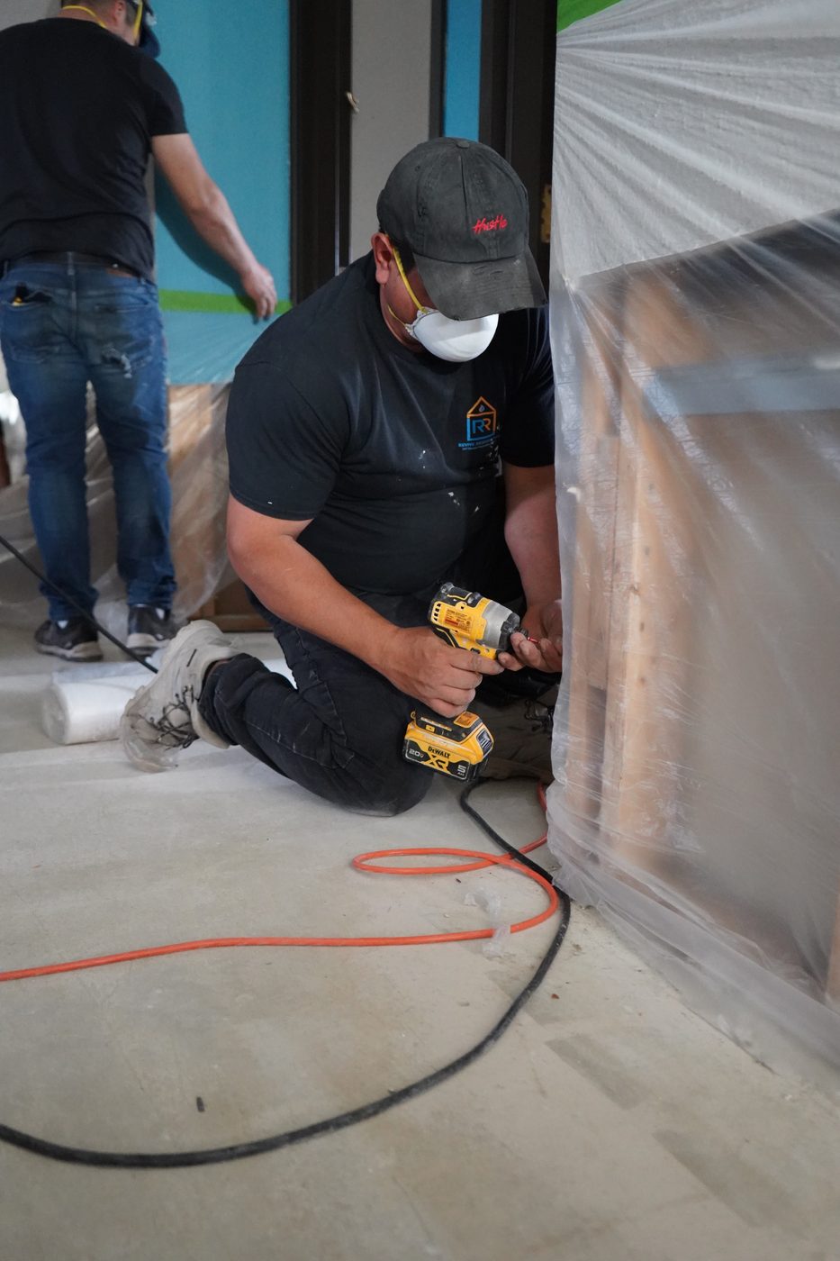 Revive Restoration crew using DeWalt tools on rebuild