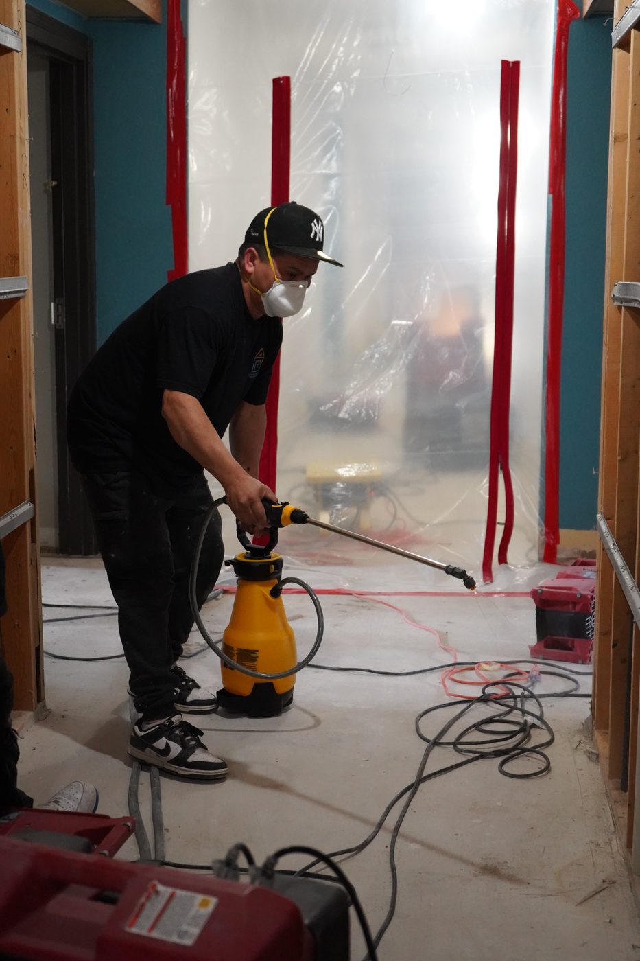 Technician working in a fire-damaged area